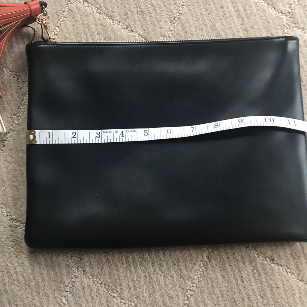 Fun fringe brand new black clutch with tassels! - Picture 4 of 5